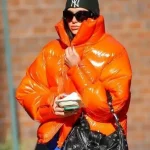 Dua Lipa Shiny Orange Puffer Jacket