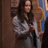 Eliza Blockbuster 2022 Melissa Fumero Gray Coat