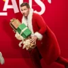 Catch Me If You Claus 2023 Luke Macfarlane Red Santa Coat