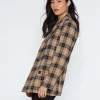 Murder In A Small Town Kristin Kreuk Checkered Coat