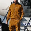 Super Bowl LIX Arrivals Travis Kelce Tracksuit Yellow