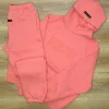 Coral Fear of God Essentials Tracksuit